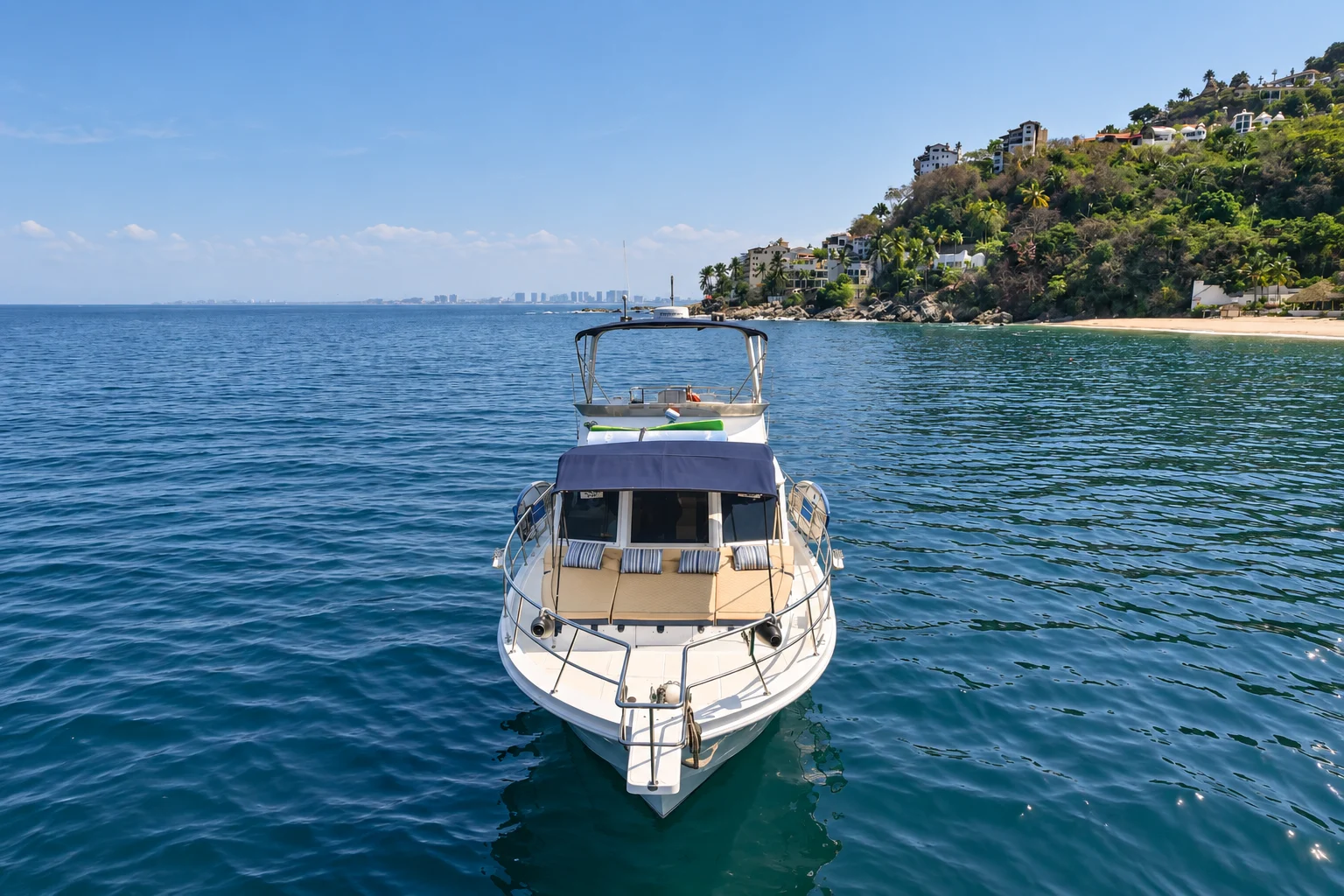 Bow view of the Uniflite with its forward lounge and flybridge