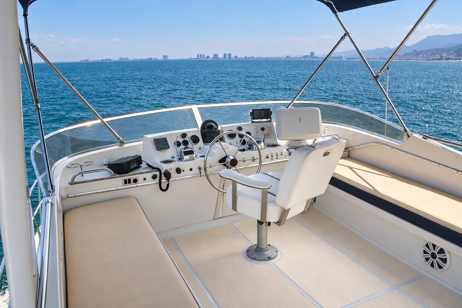 Shaded flybridge helm and seating on the Uniflite