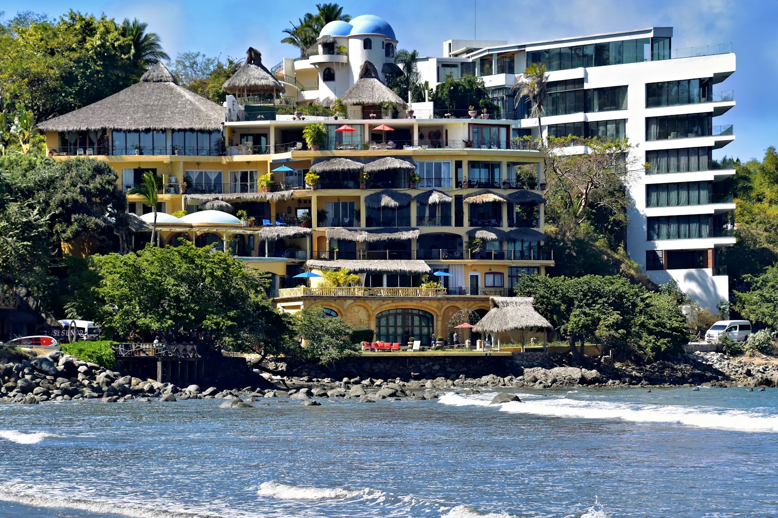 Oceanfront hotel with palm-thatched terraces in Sayulita, Nayarit